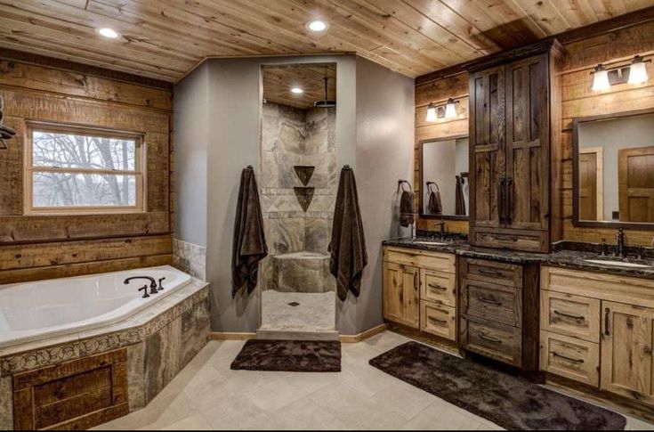 a large bathroom with wooden walls and flooring