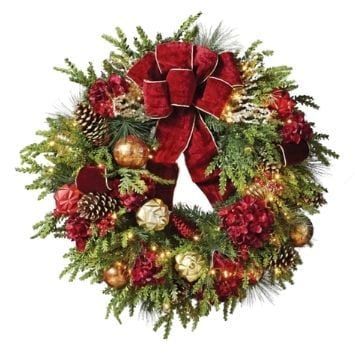 a christmas wreath with red and gold decorations