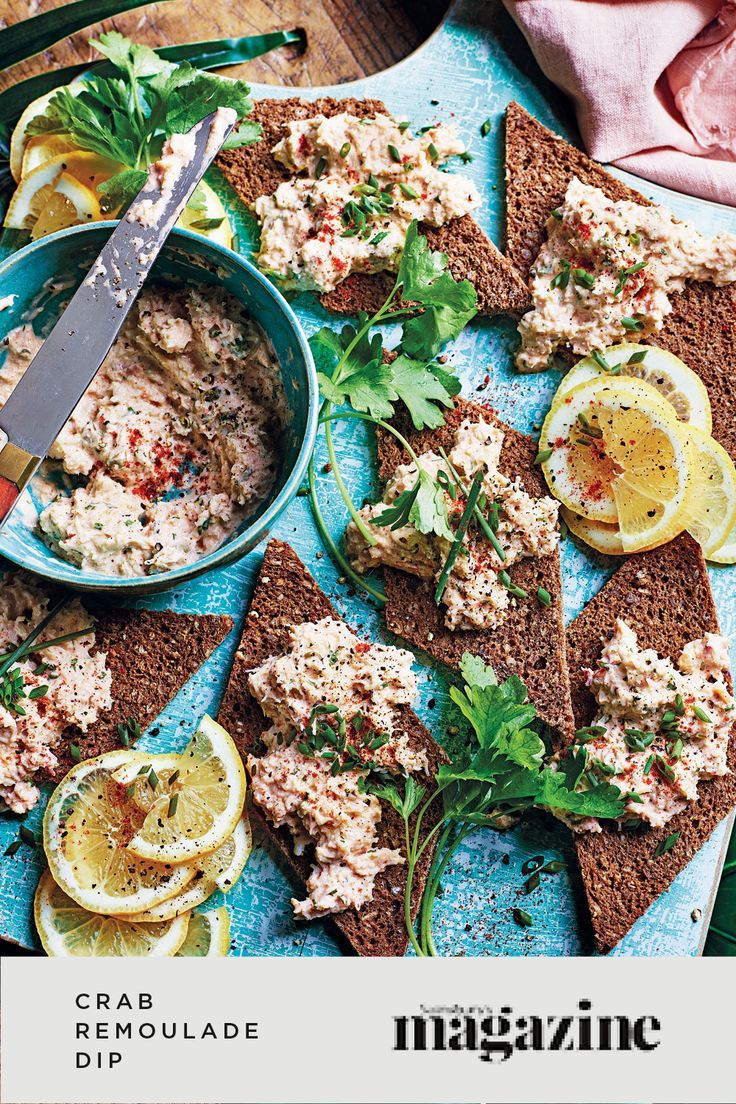 crab remoulade dip on toasted bread with lemons and parsley