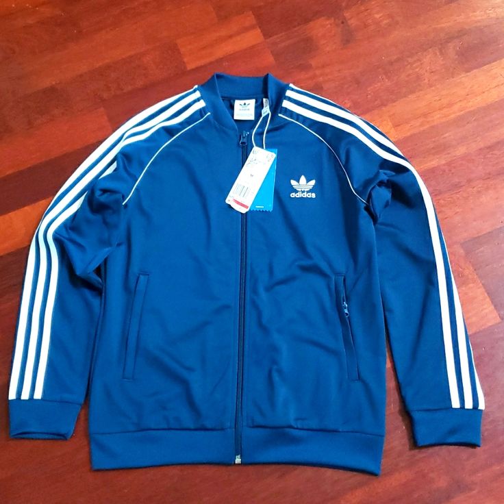 Nwt, Good Condition, Never Use Blue Track Jacket With Ribbed Cuffs For Winter, Blue Winter Track Jacket With Ribbed Cuffs, Winter Blue Track Jacket With Ribbed Cuffs, Blue Sporty Outerwear With Ribbed Cuffs, Blue Streetwear Outerwear With Three Stripes, Sporty Blue Outerwear With Ribbed Cuffs, Blue Stripe Outerwear For Streetwear, Blue Long Sleeve Track Jacket For Streetwear, Blue Hooded Outerwear With Three Stripes