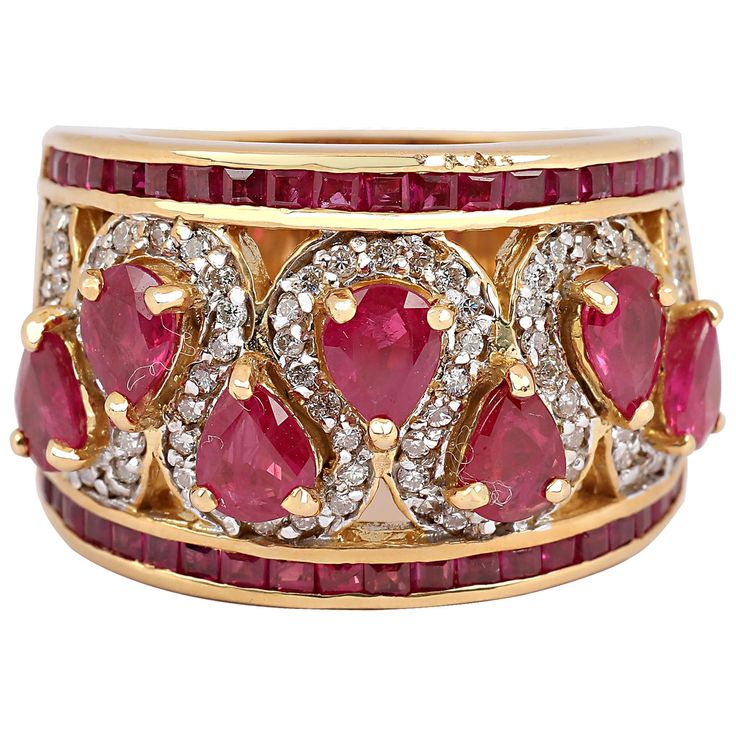 Fabricated in 18 karat yellow gold, this vintage beauty features seven alternating paisleys of bright red pear shaped rubies outlined by a sinuous framing of diamond pave. Smartly finished within a framing of square cut rubies. The pear shaped rubies weigh approximately 2.80 carats in total, the diamond pavé has a total carat weight of approximately 0.80 carats. and the square cut rubies weighing approximately 0.50 carats in total. Current ring size is 7.5. The ring can be slightly resized. Tie Ideas, Red Pear, Ruby And Diamond Ring, Beauty Features, Ruby Diamond Rings, Semi Precious Jewelry, Bolo Tie, Jewelry Tree, Bling Rings