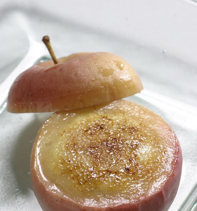 two pieces of food sitting on top of a plastic container