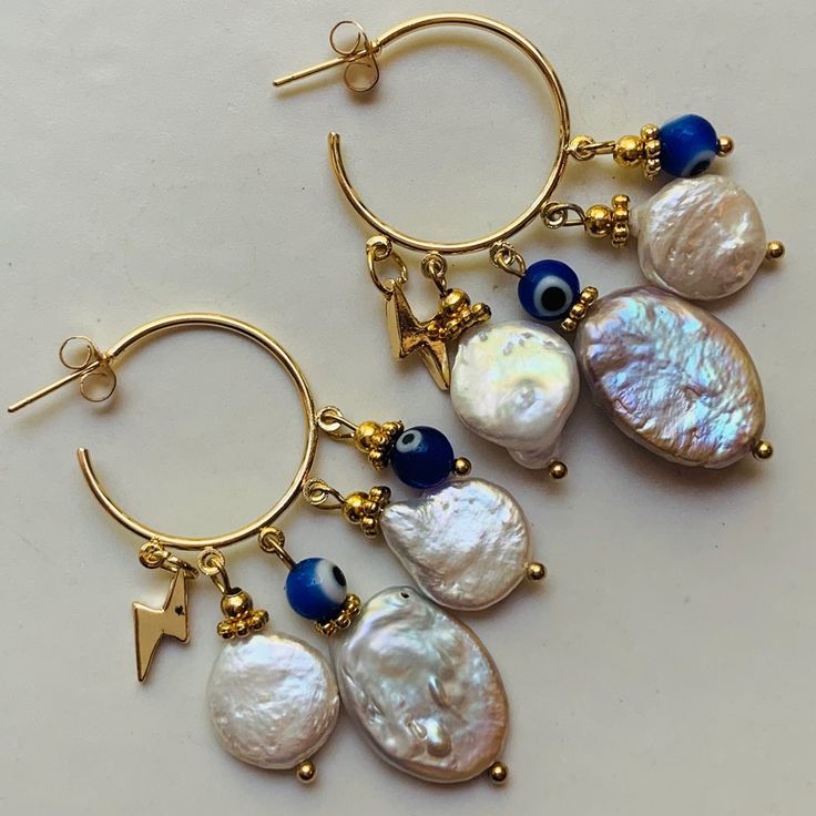 One In A Million Pair Of Earrings Made Of Mother Of Pearl, Plated Gold And Turkish Eye . Handmade Bohemian Pearl Earrings As Gift, Handmade Blue Dangle Pearl Earrings, Handmade Blue Pearl Earrings For Gift, Unique Handmade White Pearl Earrings, Blue Pearl Charm Earrings As Gift, Handmade Blue Pearl Drop Earrings, Handmade White Pearl Earrings, Handmade Blue Hoop Earrings For Gifts, Blue Pearl Drop Bohemian Earrings