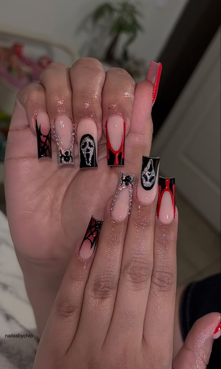 Spooky Nails With Charms, Long Black Halloween Nails, Spooky Baddie Nails, Horror Movie Acrylic Nails, Halloween Nail Sets Short, Alt Halloween Nails, Trippie Red Nails, Halloween Acrylic Nails 2024, Long Square Halloween Nails