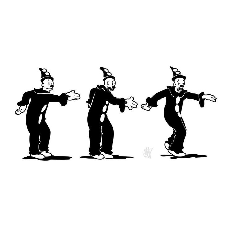 three clowns in black and white doing tricks