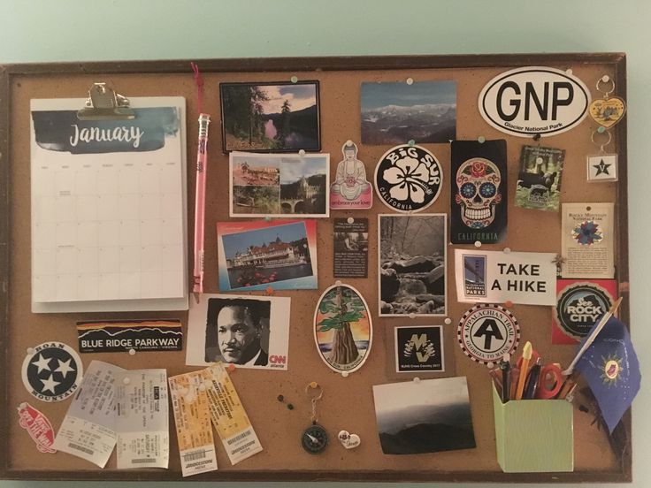 a bulletin board covered in stickers and magnets with pictures, photos, and other things on it