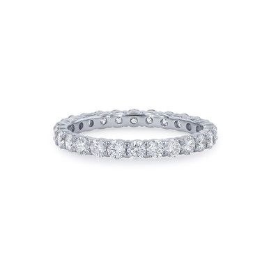 a white gold wedding band with round cut diamonds