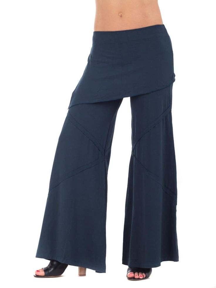 These wide leg flare pants transition through any season or occasion. Made from a mid-weight rayon jersey fabric that has the perfect flow. The flat fit fold-over waistband doubles as a skirt. [#details] Size Suggestions S: 2-4 M: 6-8 L: 10-12 [/details] [#fabric] Rayon Lycra: 90% Rayon (Viscose) / 10% Spandex (Lycra) [/fabric] Summer Wide Leg Elastane Pants, Cotton Stretch Maxi Skirt, Cotton Stretch Wide-leg Maxi Skirt, Wide Leg Stretch Cotton Maxi Skirt, Versatile Stretch Rayon Pants, Stretch Rayon Full-length Wide Leg Pants, Fitted Cotton Wide Leg Culottes, Fitted Wide Leg Cotton Culottes, Stretch Rayon Wide Leg Full Length Pants