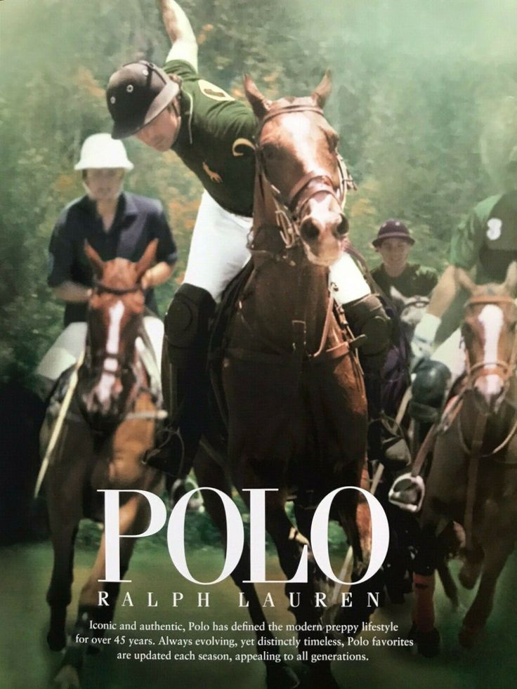 a group of men riding on the backs of brown horses in front of green trees