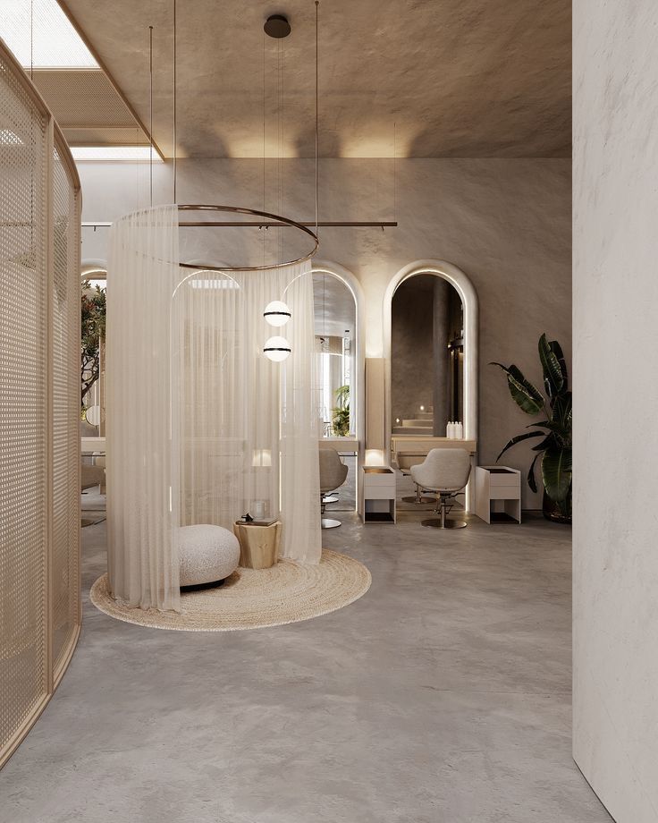 the interior of a modern living room with white walls and flooring, including round rugs