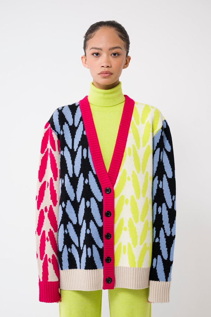 What we like most about this cardigan is the luxurious, soft hand feel and the bright and unique color blocking. Each panel of this sweater ties back to the FW23 stitches motif carried throughout the collection. Not only will it make you stand out, but you will be warm and have a timeless investment piece that lasts a lifetime. Content: 62% extra fine merino wool, 11% cashmere, 15% lycra. Hand washable. Tiera is 5'9" and wearing size XS. View our size chart, shipping and returns policy here. Multicolor Jacquard Knit Cardigan For Spring, Spring Multicolor Jacquard Knit Cardigan, Designer Multicolor Winter Sweater, Striped Skirt Pencil, Boyfriend Cardigan, Blue Logo, Blue Bow, Fitted Sweater, Off Shoulder Tops