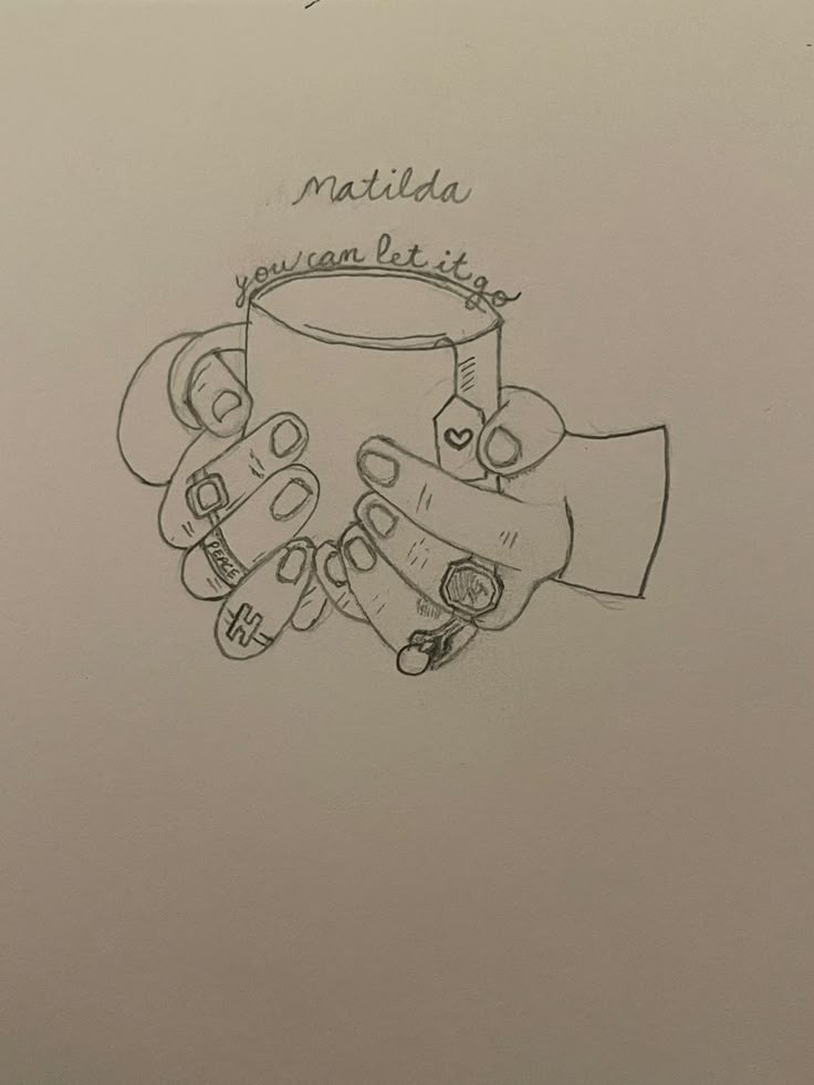 a drawing of two hands holding each other with the words matilda written above them on it