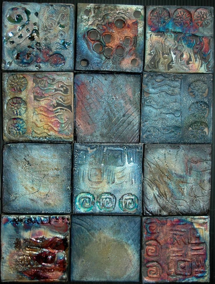 several square tiles with different designs on them