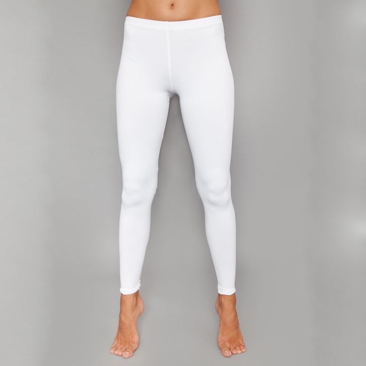 Designer Activewear.Designed and made in Miami.DESCRIPTIONUV Leggings - light solid white legging (SPF 40+ inherent in this finely knit fabric). Intended to be worn underneath any sort of choice.DETAILS & FITAthletic fit, tapered to the body.FABRIC & CARE88% Nylon / 12% SpandexSPF 40+ inherent in fabricMachine wash cold, do not bleach, tumble dry low, cool iron, do not dry clean. Snug Fit Tights For Pilates, White Compressive Elastane Leggings, White Stretch Footless Tights, White Compressive Elastane Yoga Pants, Basic White Stretch Activewear, White Compression Activewear For Pilates, White Stretch Tights, White Compressive Full-length Leggings, White Compressive Yoga Pants