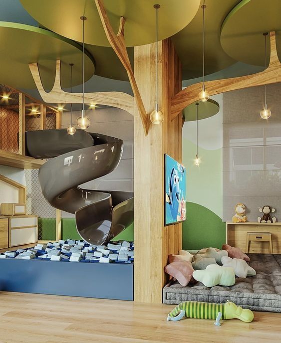 a child's bedroom with a slide and toys