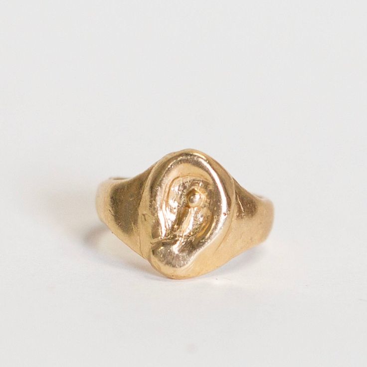 An oval signet ring with a Calla Lily carved into the face. This signet is the perfect pinky signet. Details: Ring face is 12mm tall, band is 4mm wide Ring is solid and weighs 6 grams Each ring is handmade and may vary slightly 14k jewelry is final sale May take 2 weeks to ship Oval Signet Ring, Wide Ring, Wide Rings, Calla Lily, Signet Ring, Final Sale, The Face, Ring Size, Lily