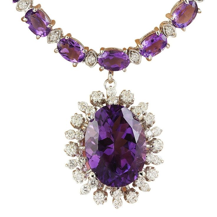 Stamped: 14KTotal Necklace Weight: 28.2 GramsNecklace Length: 18 InchesCenter Amethyst Weight: 9.12 Carat (16.00x12.00 Millimeters)Side Amethyst Weight: 26.00 Carat (6.00x4.00 Millimeters) Diamond Weight: 2.40 Carat (F-G Color, VS2-SI1 Clarity) Face Measures: 23.00x19.60 Millimeter SKU: [600424] Luxury Purple Diamond Necklace, Purple Prong Setting Formal Necklaces, Formal Amethyst Necklace In Fine Jewelry Style, Formal Fine Jewelry Amethyst Necklaces, Formal Fine Jewelry Amethyst Necklace, Formal Purple Gemstone Necklace, Luxury Amethyst Necklace With Diamond Accents, Luxury Amethyst Necklace For Formal Occasions, Exquisite Amethyst Necklace For Formal Occasions