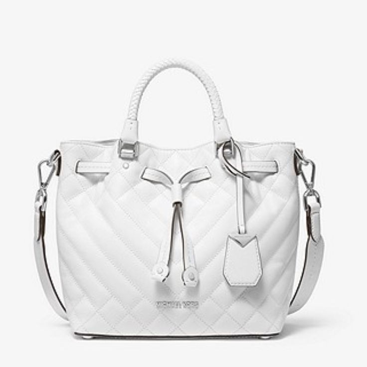 This Is A Brand New Michael Kors White Quilted Bucket Bag In Excellent Condition!!! It Comes With The Original Wrapping, Tags, And Dust Bag! Reposhing This Item I Purchased From @Kristy427. Loved It, But Ready To Rotate For Something New. Questions? Leave A Comment Below! Luxury White Pouch Satchel, White Bags With Silver-tone Hardware And Double Handle, White Crossbody Bag With Silver-tone Hardware, White Top Handle Bag With Silver-tone Hardware, White Crossbody Satchel With Silver-tone Hardware, White Satchel With Silver-tone Hardware For Errands, Michael Kors White Bag For On-the-go, White Bags With Silver-tone Hardware For Shopping, White Michael Kors Bag With Detachable Handle