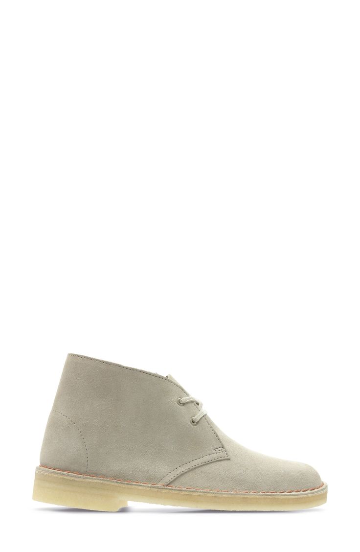 Inspired by the footwear worn by British officers in World War II, this iconic lace-up ankle boot is fashioned from soft suede and grounded by a natural crepe sole for flexible cushioning. 1" heel (size 8.5) 4" shaft Lace-up style Suede upper/leather lining/crepe sole Imported Women's Shoes Beige Lace-up Boots With Rubber Sole, Beige Desert Boots With Textured Sole And Round Toe, Beige Desert Boots With Textured Sole, Beige Desert Boots With Stitched Sole And Round Toe, Beige Desert Boots With Stitched Sole, Beige Suede High-top Lace-up Boots, Beige High-top Suede Lace-up Boots, Classic Beige Desert Boots With Stitched Sole, Beige Plain Toe Boots With Textured Sole