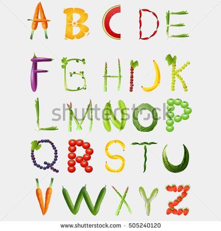 the alphabet with fruits and vegetables painted on it's sides, including carrots, grapes