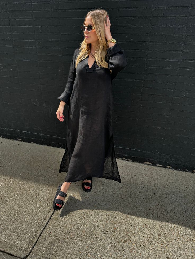 Embrace your inner fashionista with our Positano Maxi Dress. Made from 100% Italian linen, this semi-sheer dress is both light and airy, perfect for those warm summer days. Benissimo! Long sleeve sheer dress Black Light and airy One size fits most Maxi or midi depending on height Model is 5’2, wearing a S Material: 100% Italian linen Wash: Hand wash recommended. Hang to dry. Chic V-neck Linen Dress For Beach, Chic V-neck Linen Beach Dress, Elegant Long Sleeve Midi Dress For Beach Season, Long Sleeve Beachwear Midi Dress For Spring, Black Linen Summer Dress For Vacation, Chic Black Linen Beach Dress, Casual Linen Dress For Beach In Fall, Chic Midi Dress For Beach In Fall, Chic Flowy Linen Dress