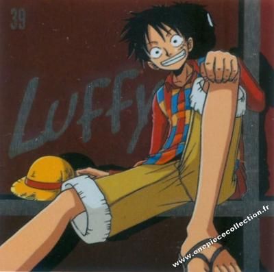 an anime character sitting on the ground with his legs crossed