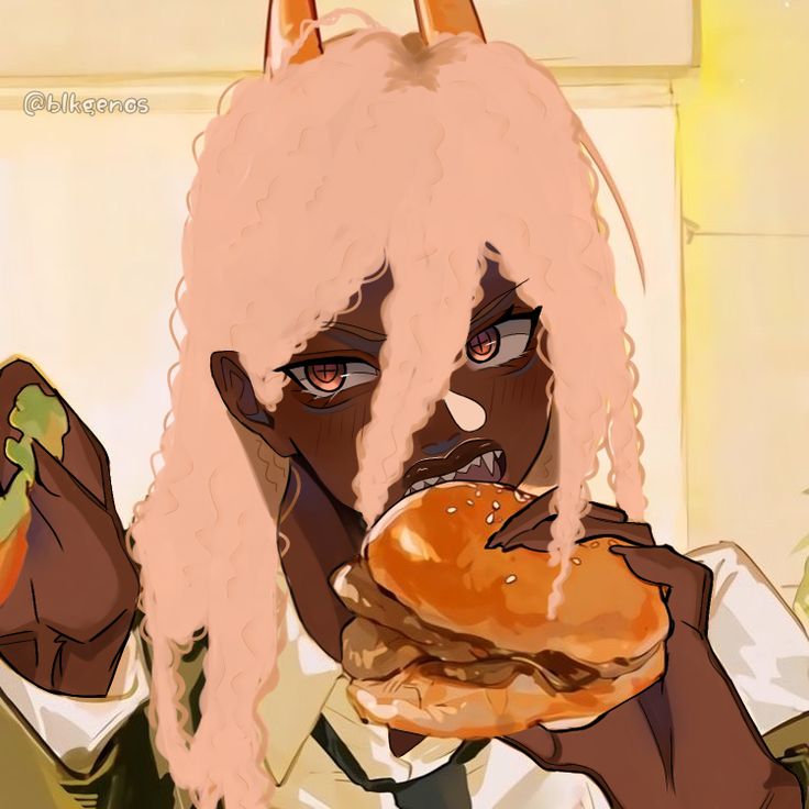 a woman with pink hair eating a large hamburger in front of her face and wearing devil horns