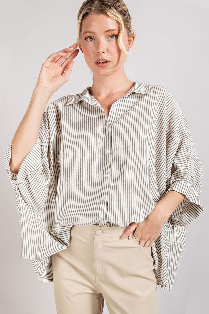 An everyday top you can throw on and you're good to go! Trust us, this is the top you'll be wearing on repeat. We love that you can dress it down or make it casual. Featured with a drapey short elbow sleeve length silhouette, functional button front closures, collared neckline, a back yoke, and a stripe overall print that is timeless. black / white stripe collared neckline short elbow length sleeves woven button front back yoke fits true to size 66% cotton, 34% polyester Amanda is 5'9" wearing a Button-up Tops With Striped Cuffs For Daywear, Affordable Button-up Top With Striped Collar, Striped Button-up Blouse With Placket, Relaxed Fit Button-up Top With Striped Cuffs, Relaxed Fit Striped Cuff Button-up Top, Elbow Sleeve, Elbow Length Sleeve, On Repeat, Button Downs