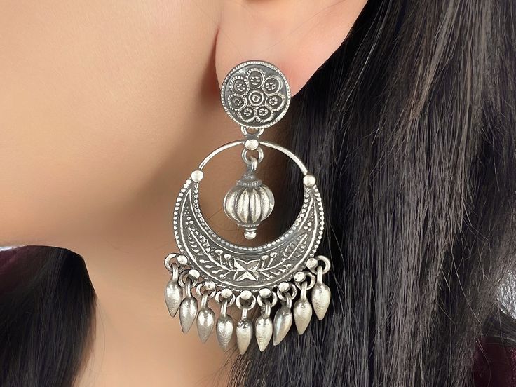 Beautifully handcrafted in Jaipur, these 925 sterling silver earrings have an excellent finish which gives out an exquisite sense of style. What's Included: 1 pair 925 Silver Earring Material: 92.5 Hallmarked Sterling Silver  Weight: 34.95 Grams Length: 2.8 Inches Width: 1.5 Inches Finish: Oxidized Silver  Nickel Free/Lead free This is handcrafted item: Our 92.5 hallmarked sterling silver jewelry is handmade by skilled artisans in Rajasthan, India using traditional,  centuries old jewelry making Rajasthan Jewellery, Indian Jewelry Earrings, Tie Ribbon, Chandbali Earrings, Sterling Silver Drop Earrings, Earring Gift, Jewelry Indian, Rajasthan India, 925 Silver Earrings