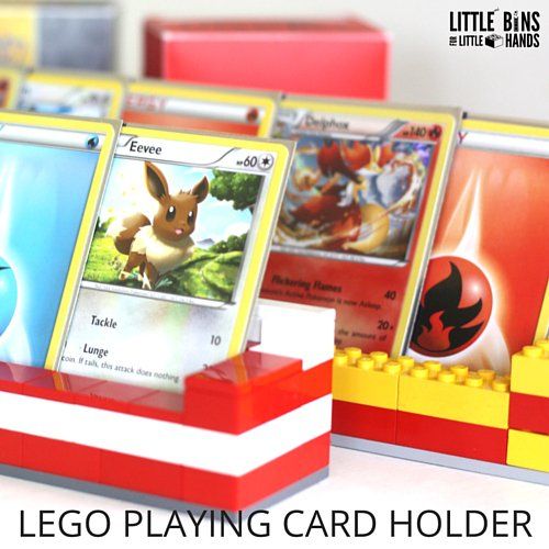 lego playing card holders with pokemon cards on them