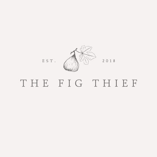 the fig thief logo is shown in black and white, with an egg on it