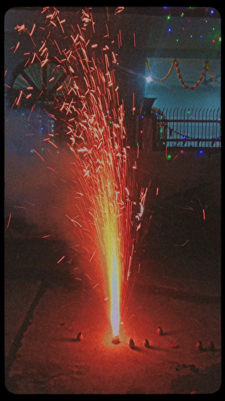 fireworks are lit up in the night sky