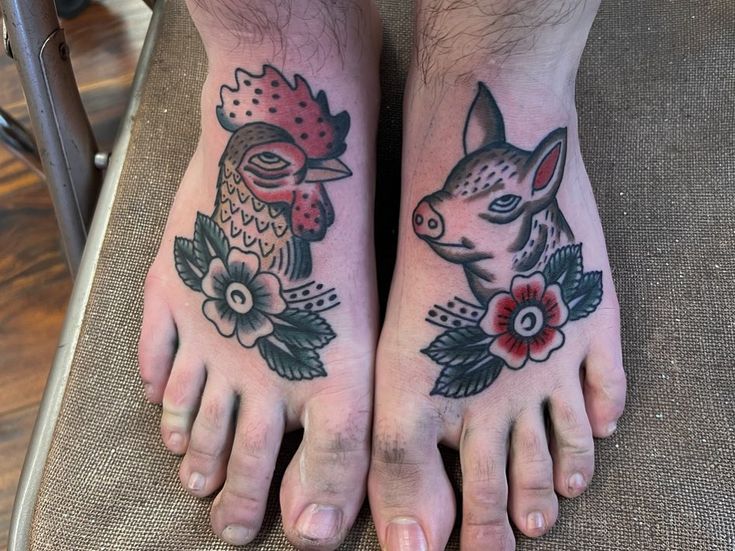 two people with tattoos on their feet and one has an animal tattoo on the foot