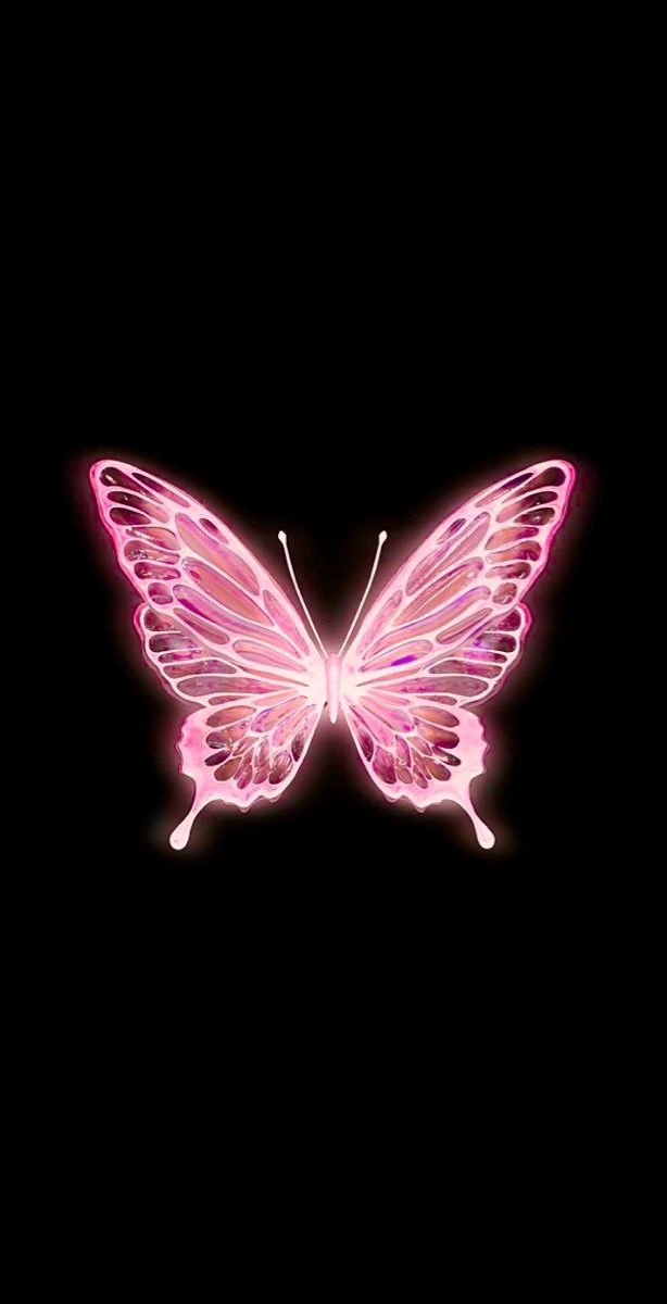 a pink butterfly flying through the air with its wings spread out and glowing in the dark