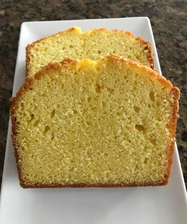 two slices of pound cake on a white plate