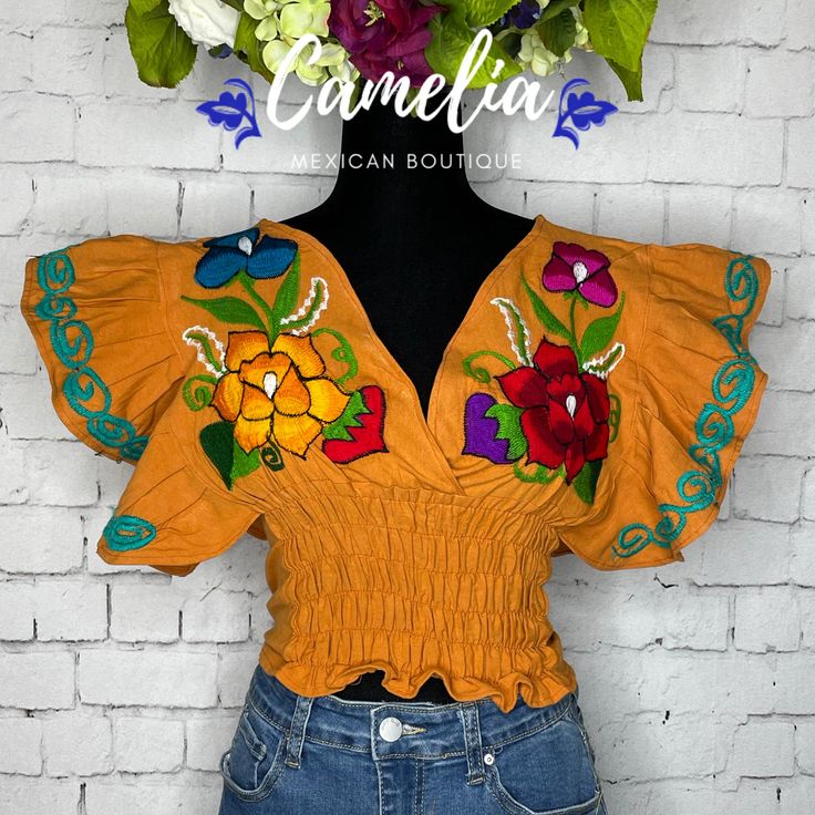 Beautiful and Chic. Our Butterfly Sleeve Crop Top is sure to make a statement. One-Size elastic waist top with embroidered V-Neck and sleeves. Made of 100% Cotton and embroidered in fine cotton yarn. Item is available in a One-Size only. Fits small to X-Large US sizes. The use of body tape is highly recommended for keeping sleeves in place. Complete the look with our handmade earrings and leather wedges and matching hat CARE: • Hand wash in cold water. • Hang dry.• Do not machine dry. Each desig Butterfly Sleeve, Matching Hat, Butterfly Sleeves, Leather Wedges, Handmade Earrings, Cotton Yarn, Cold Water, Elastic Waist, Ruffle Blouse