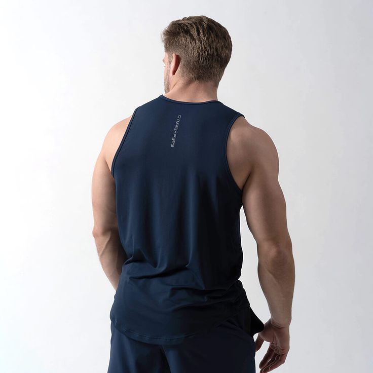 This Men's Performance Tank Top is designed to keep you comfortable without restricting your range of motion. It features moisture-wicking fabric to draw sweat away from the skin and quick-drying material to ensure you always feel dry. Ultra-soft and lightweight, this shirt is perfect for any outdoor or indoor training session. The Model is 5'11", 187lbs, wearing a size Large. Casual Activewear For Light Sports With Technical Fabric, Casual Activewear For Light Sports In Technical Fabric, Navy Moisture-wicking Activewear For Workout, Breathable Recycled Polyester Sports Top, Functional Recycled Polyester Gym Top, Sports Top In Technical Fabric, Navy Go-dry Activewear For Gym, Functional Sports Tops In Technical Fabric, Sports Tops With 4-way Stretch In Recycled Polyester