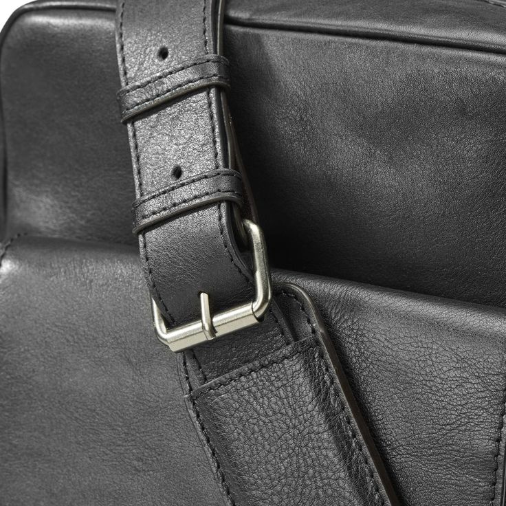 * Danish design 
 * Long-lasting YKK zippers and supple leather construction 
 * Soft, padded compartment keeps your tablet secure
 * Adjustable shoulder strap – wear over one shoulder or as a crossbody bag Leather Key Holder, Brown Leather Crossbody Bag, Leather Wear, Jewelry For Men, Leather Key, Dark Brown Leather, Pierre Cardin, Accessories Jewelry, Dark Black