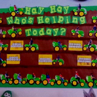 a bulletin board is decorated with tractors and people on the field, which says who's helping today?