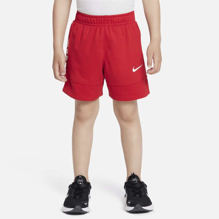 These shorts, made of poly knit fabric, are engineered for play. Quick-drying, moisture-wicking Dri-FIT technology helps keep kids cool and dry while they move, the stretch waistband provides a comfy fit and side seam pockets provide spots to stash small essentials. Red Athletic Shorts With Elastic Waistband For Sports, Red Activewear With Elastic Waistband For Sports, Sporty Red Athletic Shorts For Training, Solid Color 4-way Stretch Athletic Shorts For Training, Nike Sporty Red Athletic Shorts, Nike Sports Shorts In Red, Red Nike Activewear For Running, Red Training Shorts With Elastic Waistband, Red Go-dry Athletic Shorts For Sports