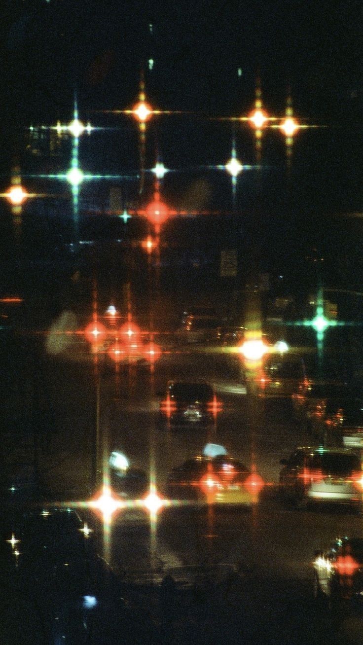 an aerial view of traffic at night in the city