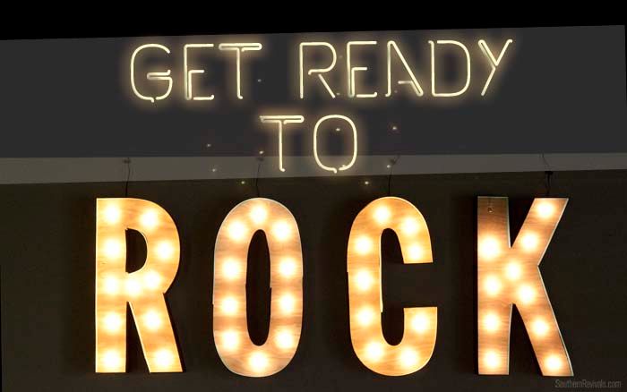 a lighted sign that says get ready to rock