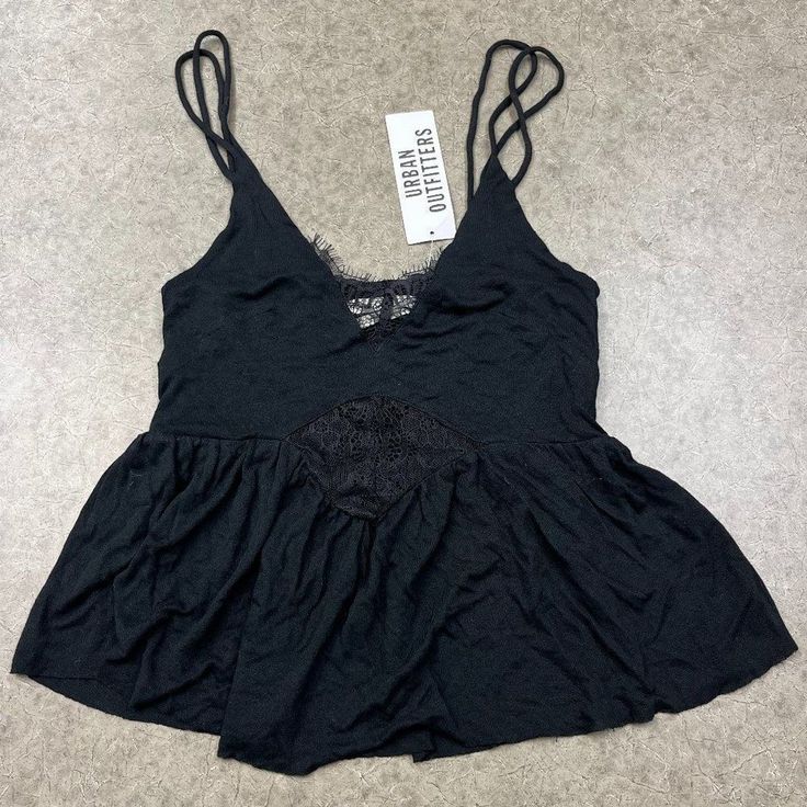 New W/ Tags Urban Outfitters Babydoll Tank Size: Small Color: Black Never Worn, Perfect Condition Babydoll Fit With A Low Cut And Sheer Lacey Detail Smoke Free Home! Ships Next Day! Black Spaghetti Strap Loungewear Top, Black Tops With Built-in Bra For Daywear, Black Spaghetti Strap Tops For Daywear, Black Cami Top For Daywear, Black Cami For Daywear, Black Top With Built-in Bra For Daywear, Daywear Tops With Built-in Bra In Black, Black Cami Tank Top For Daywear, Black Lace Trim Top For Loungewear