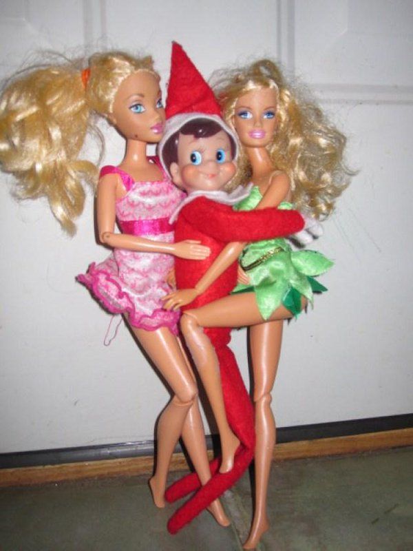 three dolls hugging each other in front of a door