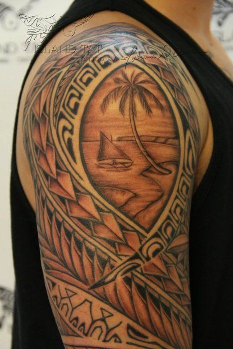 a man with a tattoo on his arm that has a boat and palm trees in it