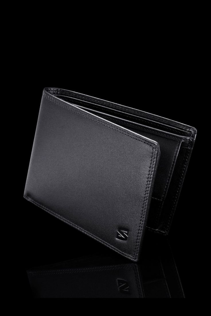 Men's black wallet by SERASAR. This wallet is made of genuine leather.- Material cow leather- Supplied in a gift box- 12 card slots- 2 banknote pockets- Coin pocket - ID card pocket- RFID security- Dimensions: 12,5 x 9,5 x 2,5 cm Classic Tan Business Wallets, Compact Formal Wallets With Card Slots, Compact Rfid Blocking Wallets For Formal Occasions, Compact Rfid-blocking Wallet For Formal Occasions, Modern Compact Wallets For Formal Use, Compact Formal Wallet With Coin Pocket, Formal Tan Leather Wallet, Tan Rectangular Wallet For Business, Tan Bifold Wallet With Card Slots