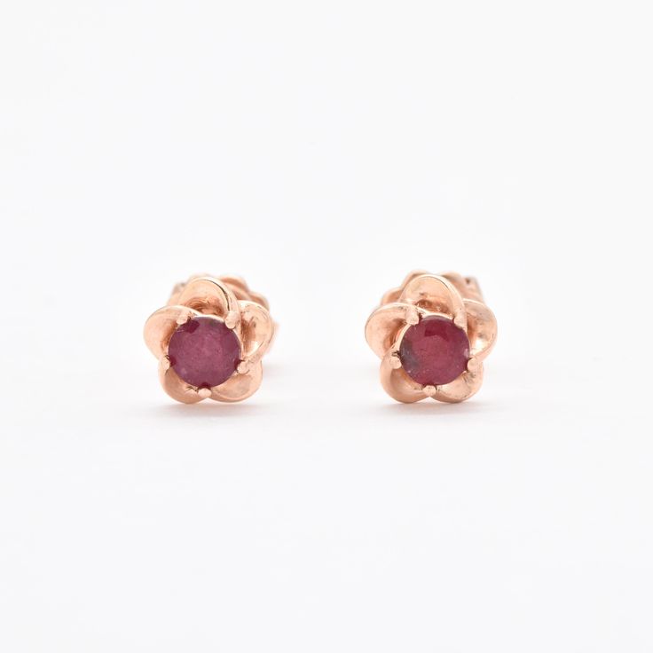 Certified Real Ruby Studs set with Ruby, size 3 millimeters diameter each, 0.3 Carats a pair.Solid 14k Rose Gold ☞ made to last.Click here for ☞ Solid Gold CollectionRuby Details:• CERTIFIED Natural Ruby • Weight: 0.3 Carats a pair• Dimensions: 3mm each• Color: Red• Cut: Round• Origin: BurmaSolid Yellow Gold Details:• 14k Solid Rose Gold• Dimensions: Length ≈ 5.6mm, Width ≈ 5.6mm• Lasts a lifetime - Perfect for everyday use (won’t tarnish)! *Final weight & dimensions depending on the chosen earr 14k Gold Flower Shaped Earrings For Anniversary, Classic 14k Gold Flower Earrings For Anniversary, Rose Gold 14k Earrings, Rose Gold Round Flower Earrings For Anniversary, 14k Pink Gold Fine Jewelry Earrings, 14k Gold Fine Jewelry Flower Earrings For Anniversary, 14k Gold Flower Earrings For Anniversary, 14k Gold Flower Earrings For Formal Occasions, Fine Jewelry 14k Pink Gold Earrings