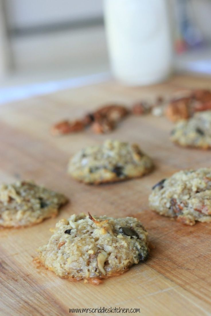 the cookies are ready to be eaten on the cutting board with milk in the background