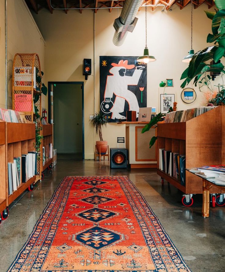 a room filled with lots of furniture and rugs