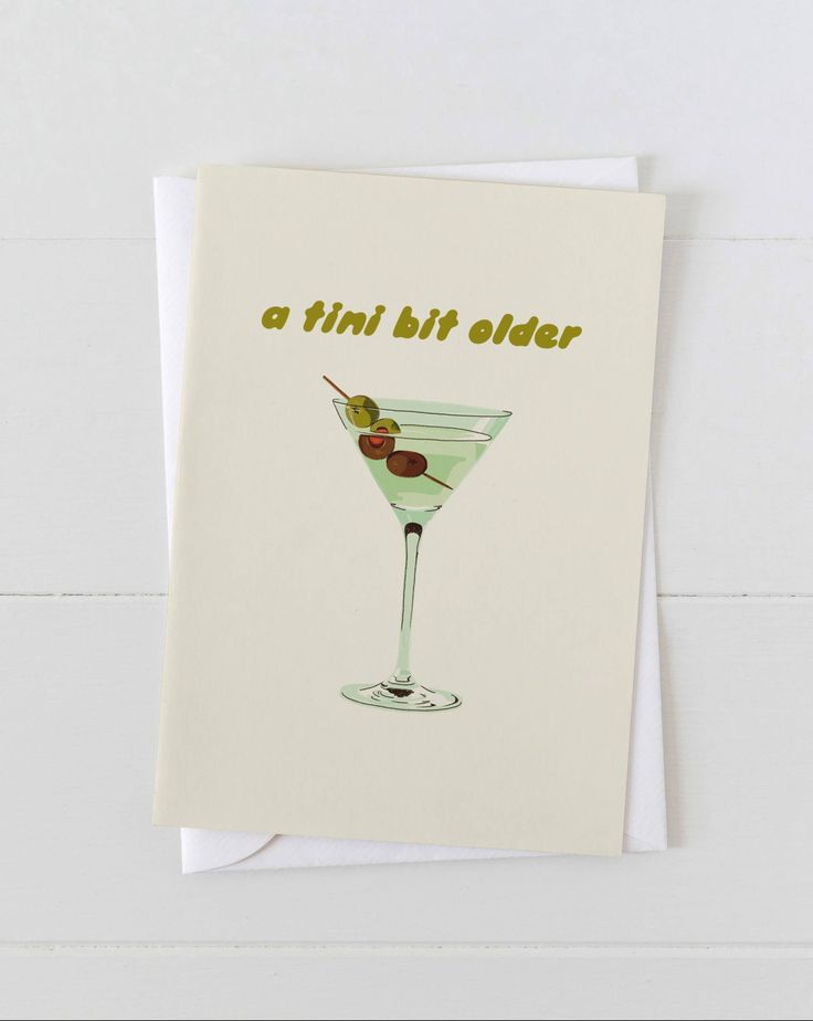 a card with an illustration of a martini glass and olives on the rim reads, a thin bit older